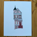 Illustration of a three-story pink victorian house